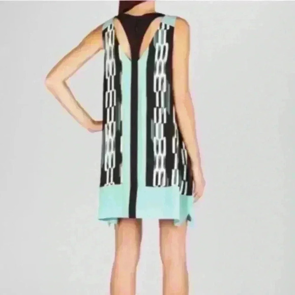 BCBG MaxAzria  | Amelia dress with cut outs black and teal size small - Picture 2 of 6